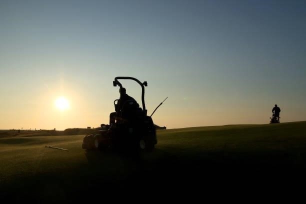 Greenkeepers are seen mowing on the tenth hole ahead of Day One of The 149th Open at Royal St George’s Golf Club on July 15, 2021 in Sandwich,...