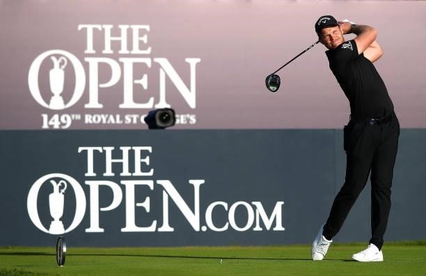 Danny Willett of England plays his shot from the first tee during Day One of The 149th Open at Royal St George’s Golf Club on July 15, 2021 in...