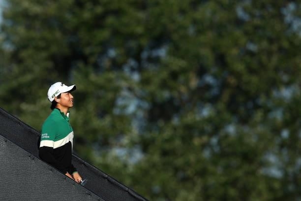 Min Woo Lee of Australia makes their way towards the first tee during Day One of The 149th Open at Royal St George’s Golf Club on July 15, 2021 in...