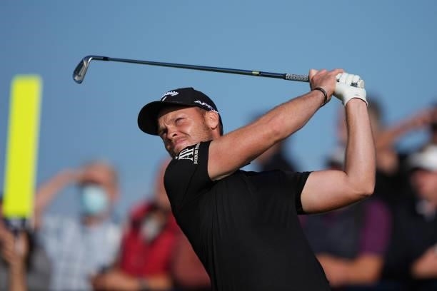 Danny Willett of England plays his shot from the third tee during Day One of The 149th Open at Royal St George’s Golf Club on July 15, 2021 in...