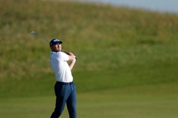Richard Mansell of England plays a shot on the fourth hole during Day One of The 149th Open at Royal St George’s Golf Club on July 15, 2021 in...