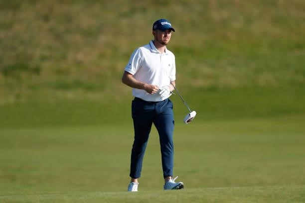Richard Mansell of England looks on after playing a shot on the fourth hole during Day One of The 149th Open at Royal St George’s Golf Club on July...