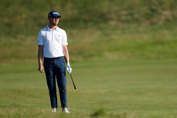 Richard Mansell of England looks on after playing a shot on the fourth hole during Day One of The 149th Open at Royal St George’s Golf Club on July...