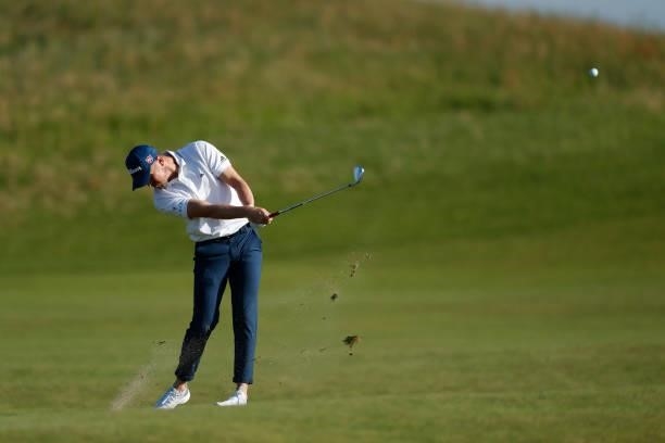 Richard Mansell of England plays a shot on the fourth hole during Day One of The 149th Open at Royal St George’s Golf Club on July 15, 2021 in...