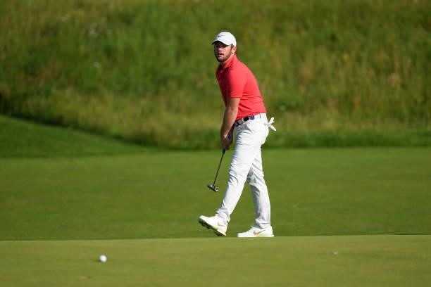 Sam Horsfield of England plays a shot on the green of the third hole during Day One of The 149th Open at Royal St George’s Golf Club on July 15, 2021...