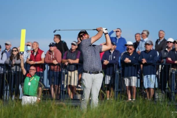 Dean Burmester of South Africa plays his shot from the third tee during Day One of The 149th Open at Royal St George’s Golf Club on July 15, 2021 in...