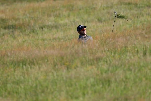 Daniel Berger of the United States plays a shot on the fourth hole during Day One of The 149th Open at Royal St George’s Golf Club on July 15, 2021...