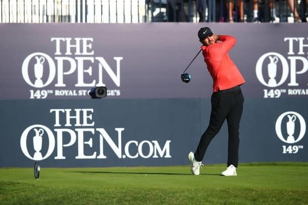 Brooks Koepka of the United States plays his shot from the first tee during Day One of The 149th Open at Royal St George’s Golf Club on July 15, 2021...