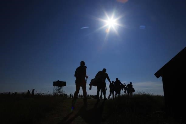 Players make their way along the third hole during Day One of The 149th Open at Royal St George’s Golf Club on July 15, 2021 in Sandwich, England.