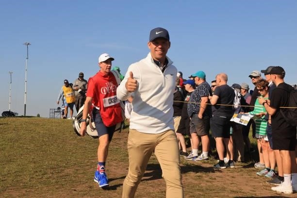 Paul Casey of England gestures as he makes his way from hole two during Day One of The 149th Open at Royal St George’s Golf Club on July 15, 2021 in...