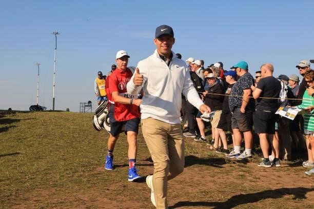 Paul Casey of England gestures as he makes his way from hole two during Day One of The 149th Open at Royal St George’s Golf Club on July 15, 2021 in...