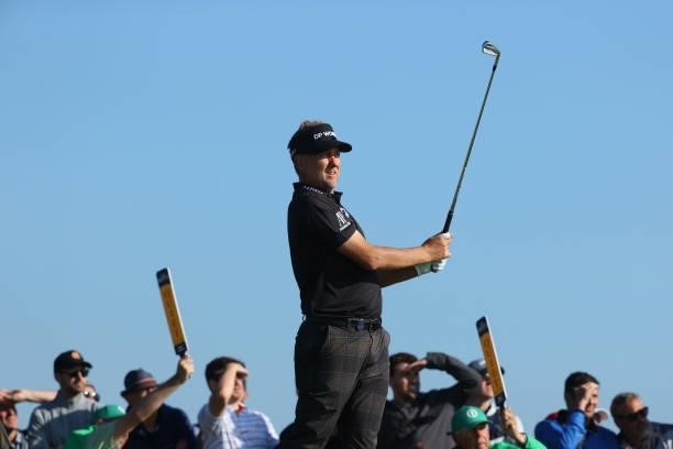 Ian Poulter of England plays his shot from the third tee during Day One of The 149th Open at Royal St George’s Golf Club on July 15, 2021 in...