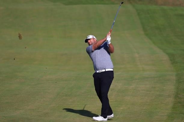 Jack Senior of England plays a shot on the first hole during Day One of The 149th Open at Royal St George’s Golf Club on July 15, 2021 in Sandwich,...