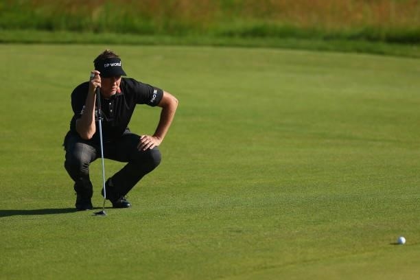 Ian Poulter of England lines up a putt on the 3rd green during Day One of The 149th Open at Royal St George’s Golf Club on July 15, 2021 in Sandwich,...