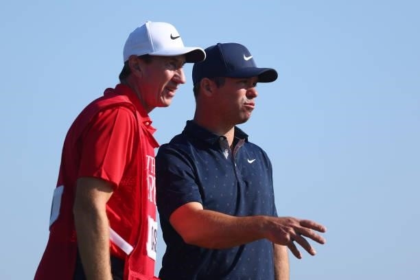 Paul Casey of England and caddie look ahead on the 3rd tee during Day One of The 149th Open at Royal St George’s Golf Club on July 15, 2021 in...