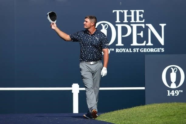 Bryson DeChambeau of the United States acknowledges the fans during Day One of The 149th Open at Royal St George’s Golf Club on July 15, 2021 in...