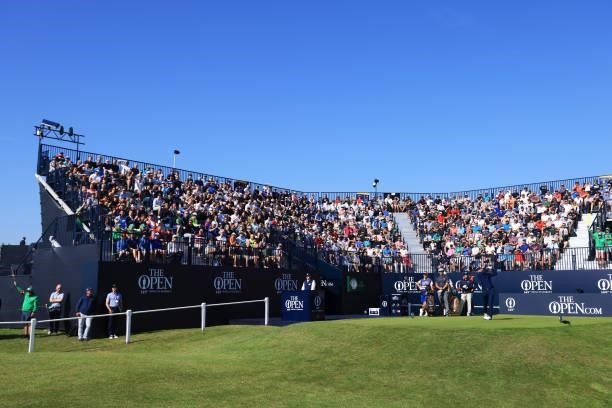 Fans watch on as Jordan Spieth of the United States plays his shot from the first tee during Day One of The 149th Open at Royal St George’s Golf Club...