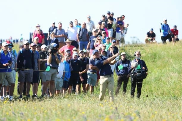 Paul Casey of England plays his second shot on the seventh hole during Day One of The 149th Open at Royal St George’s Golf Club on July 15, 2021 in...