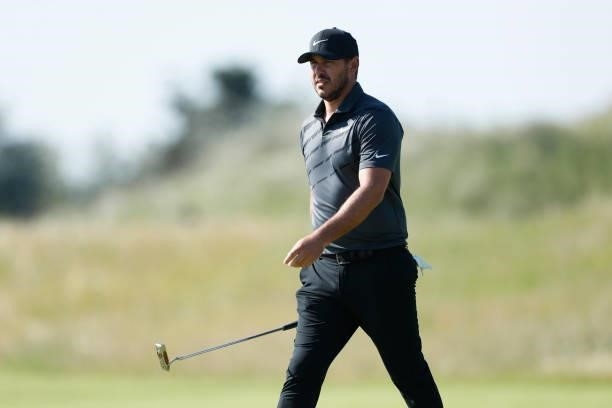 Brooks Koepka of the United States looks on after a shot on the green of the fifth hole during Day One of The 149th Open at Royal St George’s Golf...