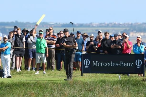 Ian Poulter of England plays his shot from the eighth tee during Day One of The 149th Open at Royal St George’s Golf Club on July 15, 2021 in...