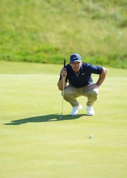 Paul Casey of England lines up a shot on the green of the sixth hole during Day One of The 149th Open at Royal St George’s Golf Club on July 15, 2021...