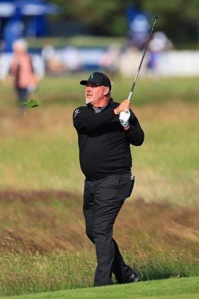 Darren Clarke of Northern Ireland plays his third shot on the 1st hole during Day One of The 149th Open at Royal St George’s Golf Club on July 15,...