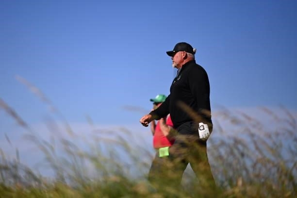 Darren Clarke of Northern Ireland walks on the 4th hole during Day One of The 149th Open at Royal St George’s Golf Club on July 15, 2021 in Sandwich,...