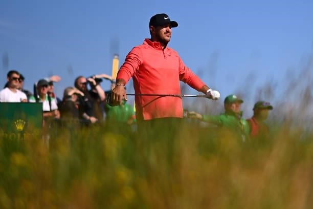 Brooks Koepka of The United States reacts on the 2nd tee during Day One of The 149th Open at Royal St George’s Golf Club on July 15, 2021 in...