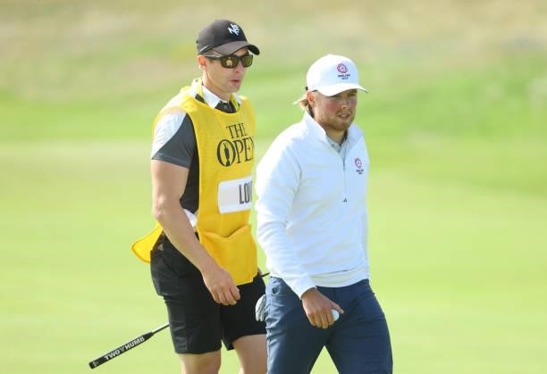 Amateur Joe Long of England looks on from the green of the seventh hole during Day One of The 149th Open at Royal St George’s Golf Club on July 15,...