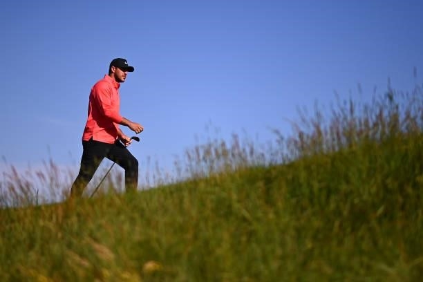 Brooks Koepka of The United States walks on the 2nd hole during Day One of The 149th Open at Royal St George’s Golf Club on July 15, 2021 in...