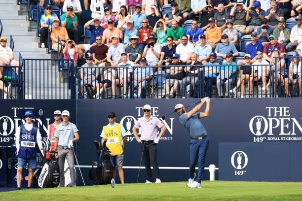 Dustin Johnson of the United States plays his shot from the first tee during Day One of The 149th Open at Royal St George’s Golf Club on July 15,...
