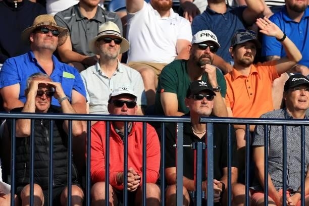 Spectators watch play on the first tee during Day One of The 149th Open at Royal St George’s Golf Club on July 15, 2021 in Sandwich, England.