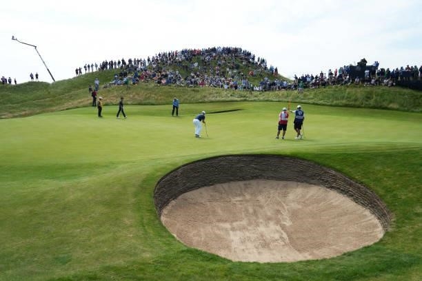 General view as Ernie Els of South Africa puts a shot on the green of the sixth hole during Day One of The 149th Open at Royal St George’s Golf Club...