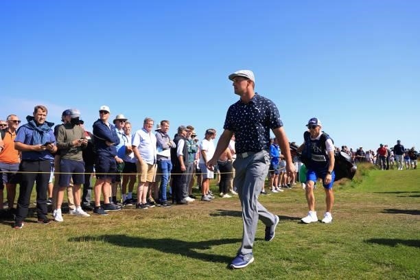 Bryson Dechambeau of The United States walks on the 2nd tee during Day One of The 149th Open at Royal St George’s Golf Club on July 15, 2021 in...
