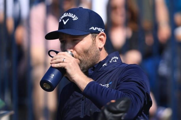 Brandon Grace of South Africa drinks from a reusable bottle during Day One of The 149th Open at Royal St George’s Golf Club on July 15, 2021 in...