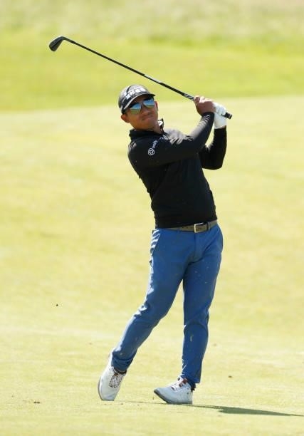 Pan of Taiwan plays a shot on the ninth hole during Day One of The 149th Open at Royal St George’s Golf Club on July 15, 2021 in Sandwich, England.