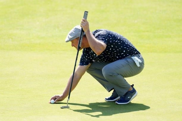 Bryson DeChambeau of the United States lines up a shot on the green of the sixth hole during Day One of The 149th Open at Royal St George’s Golf Club...