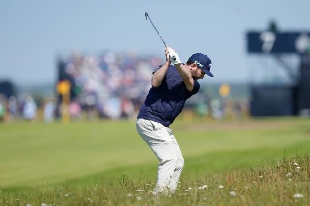 Branden Grace of South Africa plays a shot on the seventh hole during Day One of The 149th Open at Royal St George’s Golf Club on July 15, 2021 in...