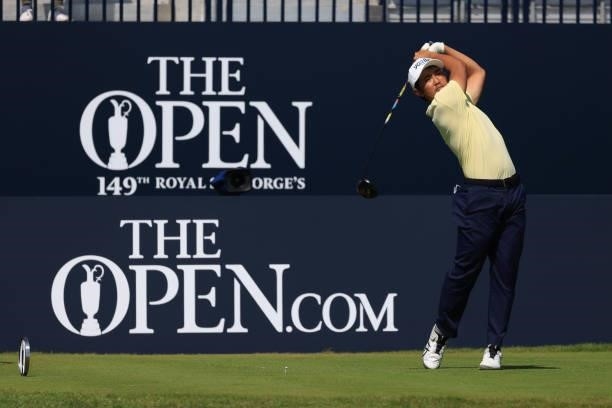 Takumi Kanaya of Japan plays his shot from the first tee during Day One of The 149th Open at Royal St George’s Golf Club on July 15, 2021 in...