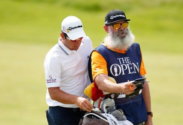 Lucas Herbert of Australia picks a club on the ninth hole during Day One of The 149th Open at Royal St George’s Golf Club on July 15, 2021 in...