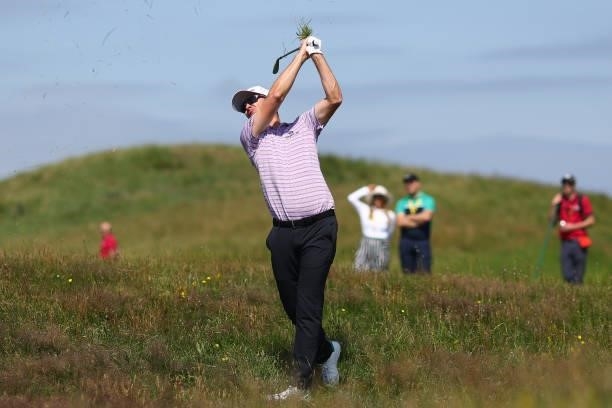 Justin Rose of England plays a shot on the 4th hole during Day One of The 149th Open at Royal St George’s Golf Club on July 15, 2021 in Sandwich,...