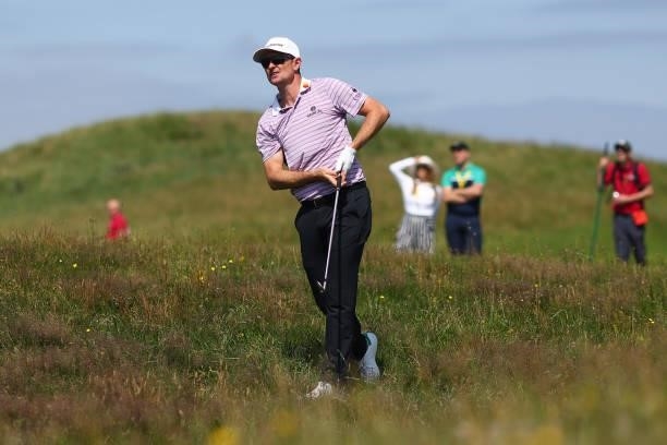 Justin Rose of England plays a shot on the 4th hole during Day One of The 149th Open at Royal St George’s Golf Club on July 15, 2021 in Sandwich,...