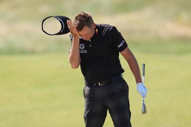 Ian Poulter of England reacts during Day One of The 149th Open at Royal St George’s Golf Club on July 15, 2021 in Sandwich, England.