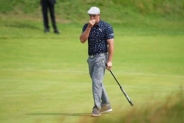 Bryson DeChambeau of the United States reacts after a missed put on the green of the eighth hole during Day One of The 149th Open at Royal St...