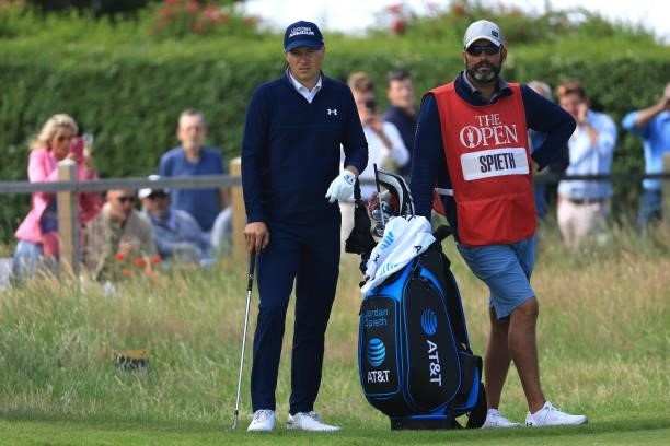 Jordan Speith of United States and caddie Michael Greller look on during Day One of The 149th Open at Royal St George’s Golf Club on July 15, 2021 in...