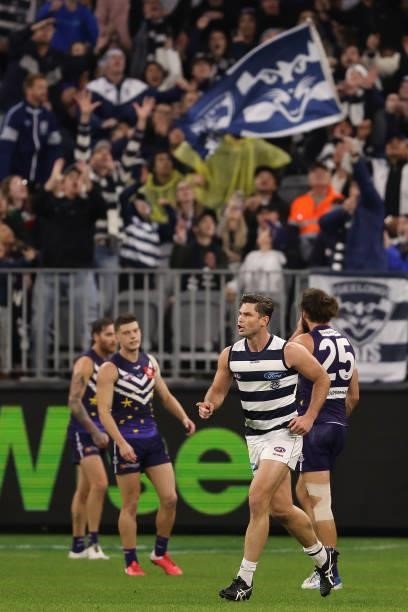 Tom Hawkins of the Cats celebrates a goal during the round 18 AFL match between the Fremantle Dockers and Geelong Cats at Optus Stadium on July 15,...