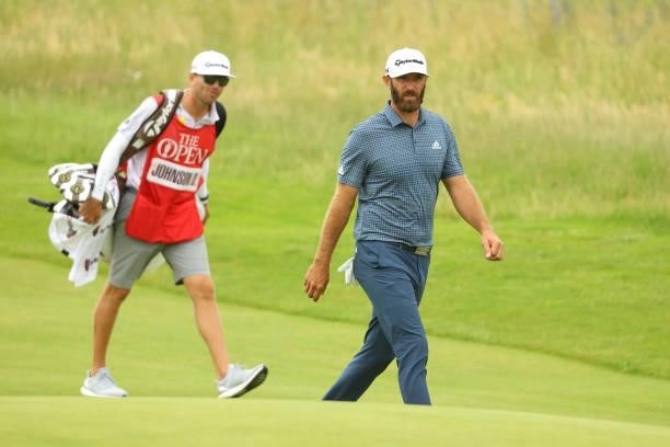 Dustin Johnson of the United States makes his way along the seventh hole during Day One of The 149th Open at Royal St George’s Golf Club on July 15,...