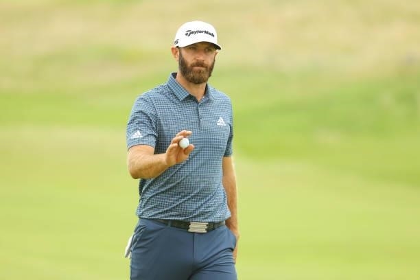 Dustin Johnson of the United States reacts on the green of the seventh hole during Day One of The 149th Open at Royal St George’s Golf Club on July...