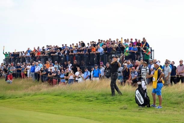 Ian Poulter of England plays his third shot on the 14th hole during Day One of The 149th Open at Royal St George’s Golf Club on July 15, 2021 in...