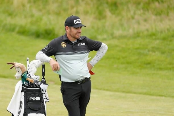 Louis Oosthuizen of South Africa looks on before playing a shot on the ninth hole during Day One of The 149th Open at Royal St George’s Golf Club on...